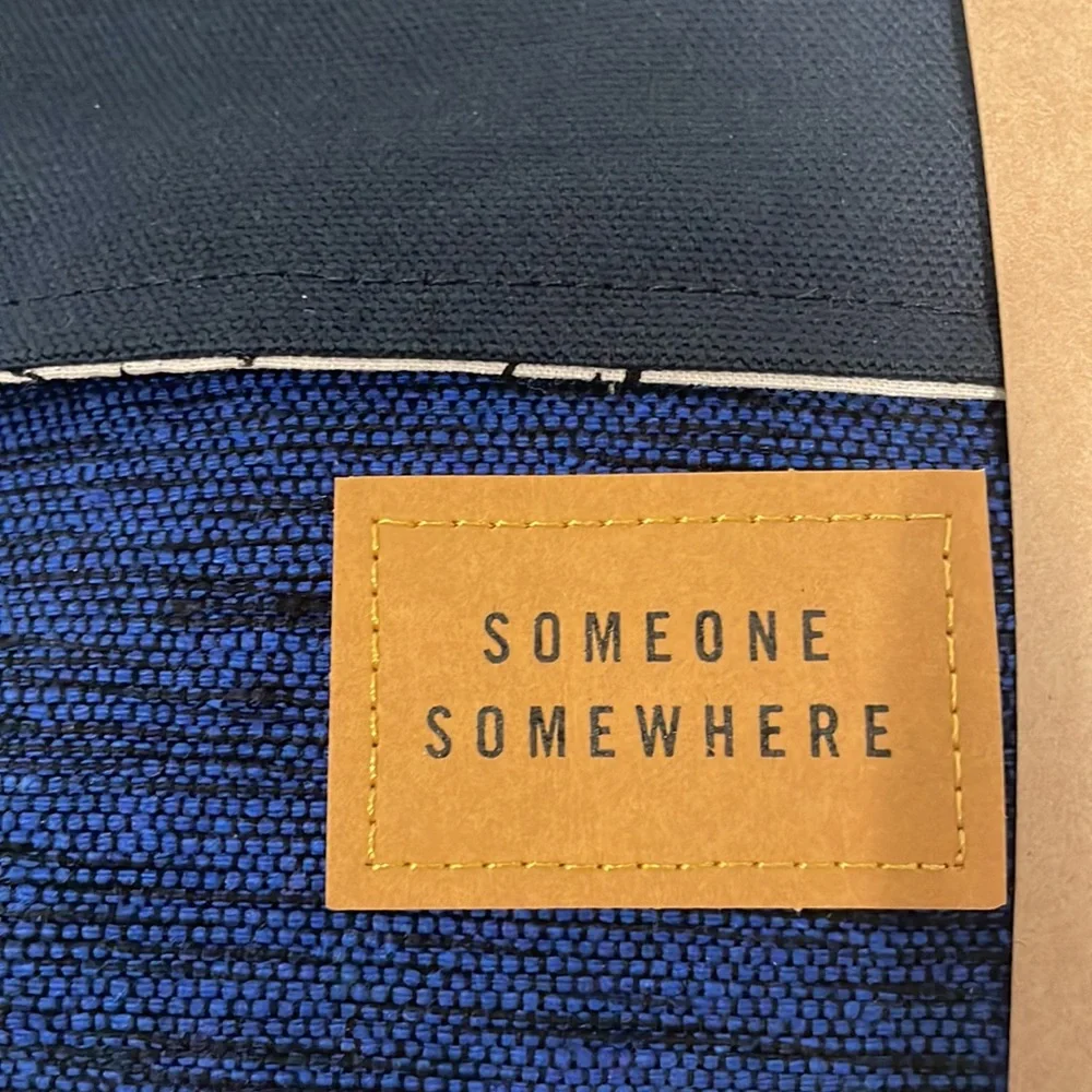 Delta One Someone Somewhere Artisan-Made Amenity Kit. Royal Blue. NWT